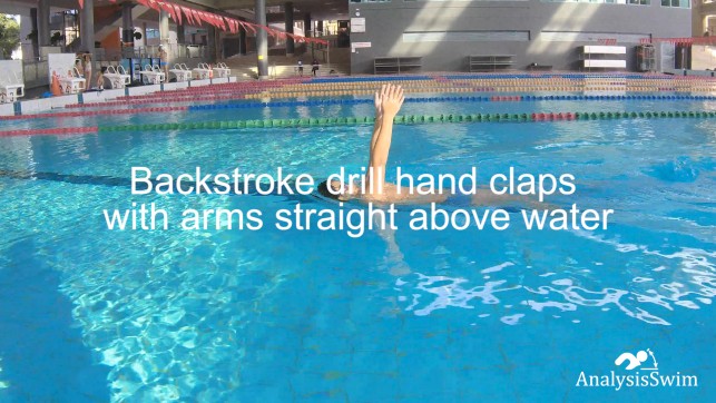 фото для Backstroke drill hand claps with arms straight above water